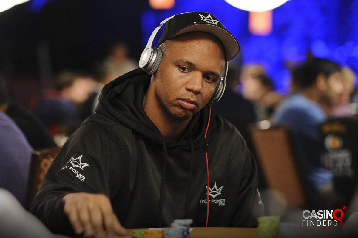 Phil Ivey wearing headphones while playing a live poker event